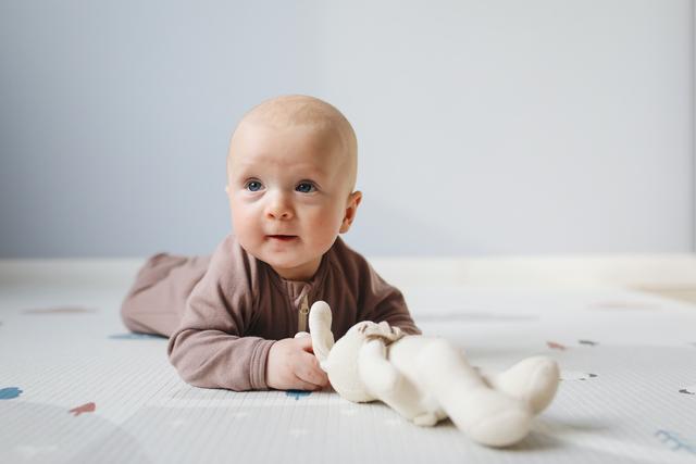 What Age Should Babies Start Tummy Time? cover image
