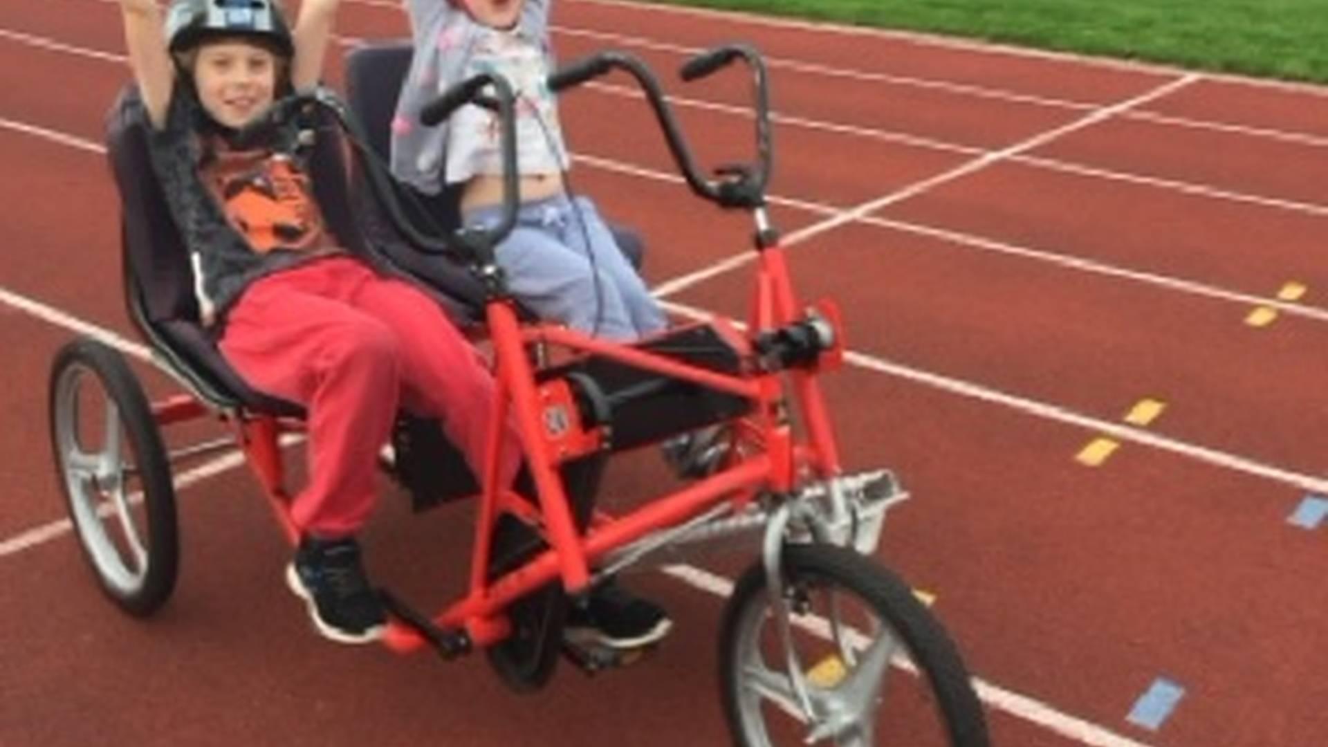 Inclusive family cycling photo